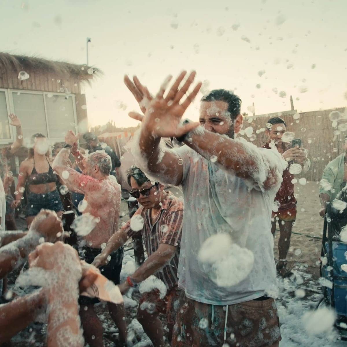 A dancer in the middle of the foam party